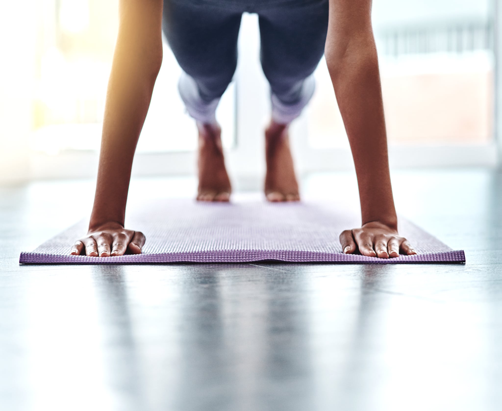 Cropped shot of an unrecognizable woman doing push-ups