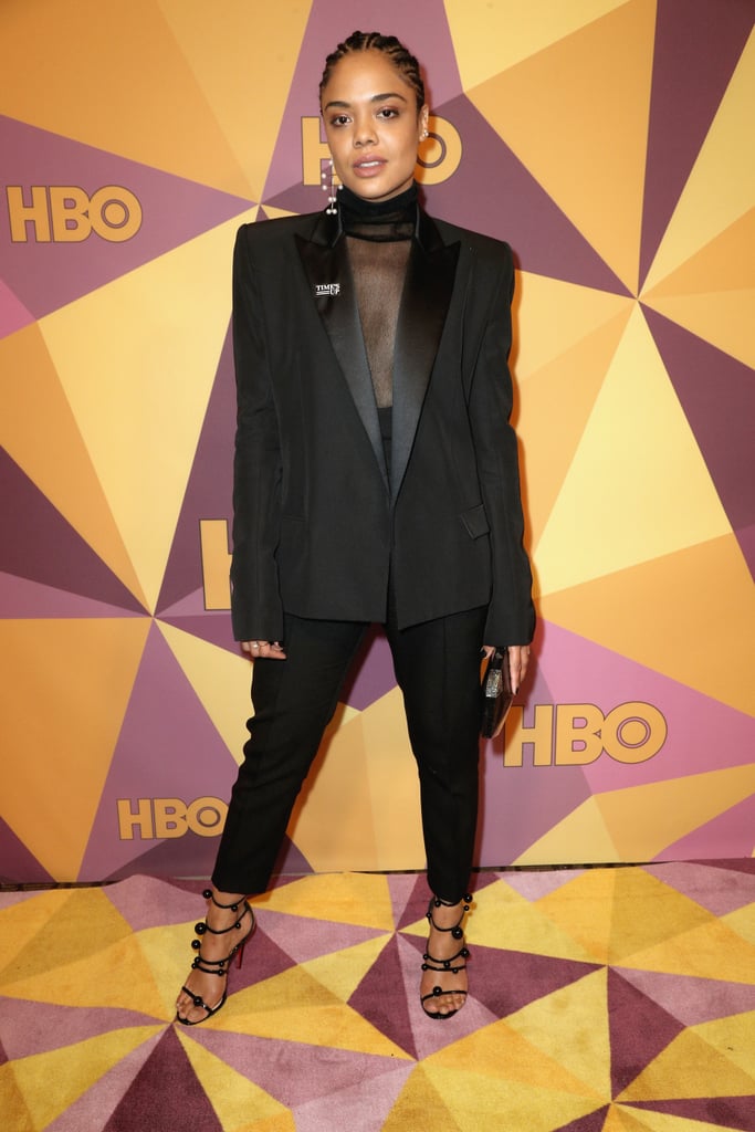 Tessa Thompson Wearing a Black Tuxedo and Sheer Top in 2018