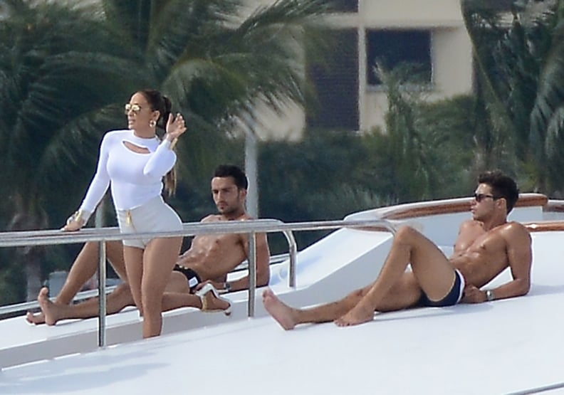 This is her filming a music video months later, on a yacht, surrounded by hot, tan, shirtless men. Casual.