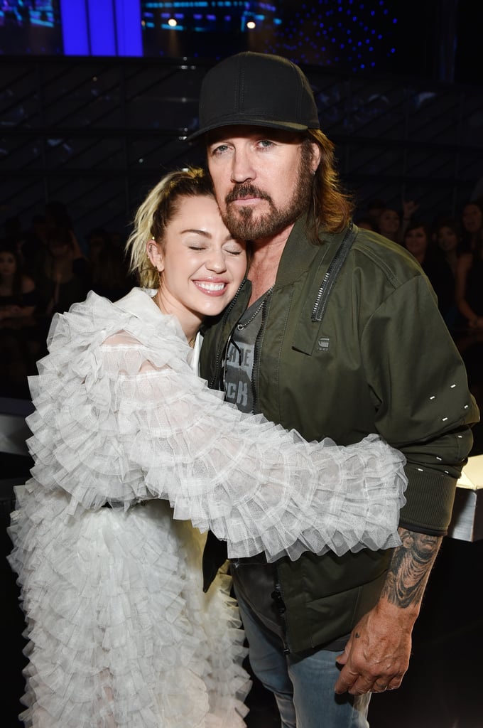 Miley Cyrus has a tight-knit family, but she clearly shares a special bond with her dad, Billy Ray Cyrus. From 2006 to 2011, the two played onscreen father and daughter on the hit Disney Channel show Hannah Montana, and they've given us even more glimpses of their sweet relationship over the years. Not only have they shared the stage together on countless occasions, including the Glastonbury Festival in 2019, but Billy is always there to cheer Miley on at award shows. Miley has also shown her support for Billy as she promoted his and Lil Nas X's hit song "Old Town Road." In honor of Father's Day, see some of the pair's cutest father-daughter moments ahead. 

    Related:

            
            
                                    
                            

            We Can&apos;t Get Enough of Miley Cyrus and Her Famous Family