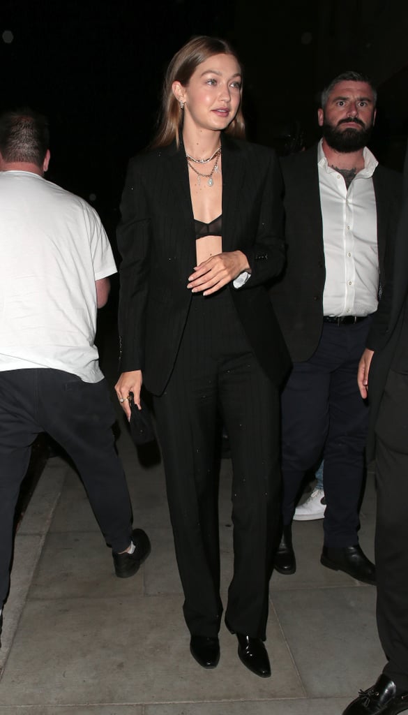 Gigi Hadid Wearing a Black Suit and Bra in London