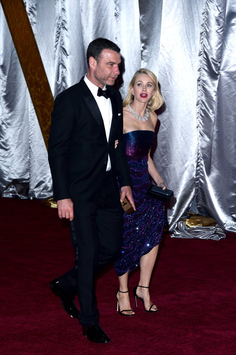 Naomi Watts Paying Careful Attention to Her Armani Privé Gown Upon Exit