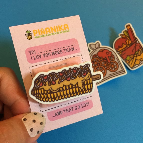 This adorable pin will look great with the rest of the ones you have on your backpack or jean jacket. 
Elote Brooche ($5-$12)