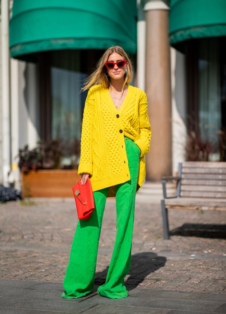 Go bright with an oversize cardigan and contrasting pants in an equally bold hue.
