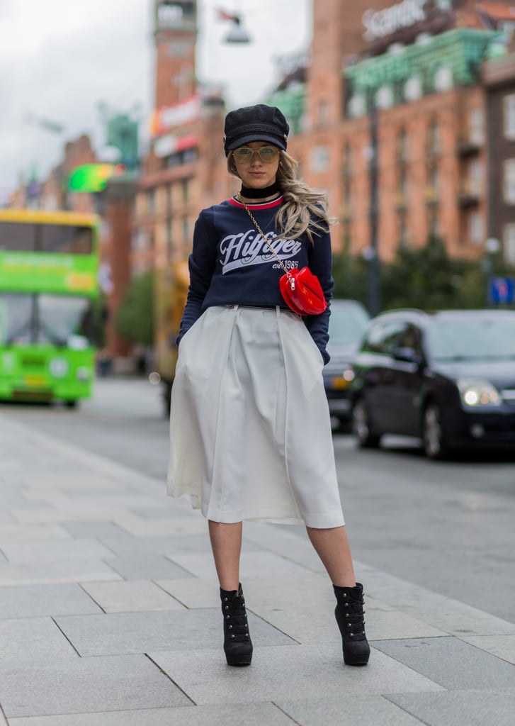 Joicy Muniz Wore a Tommy Hilfiger Navy Sweater With a White Skirt and Platform Booties