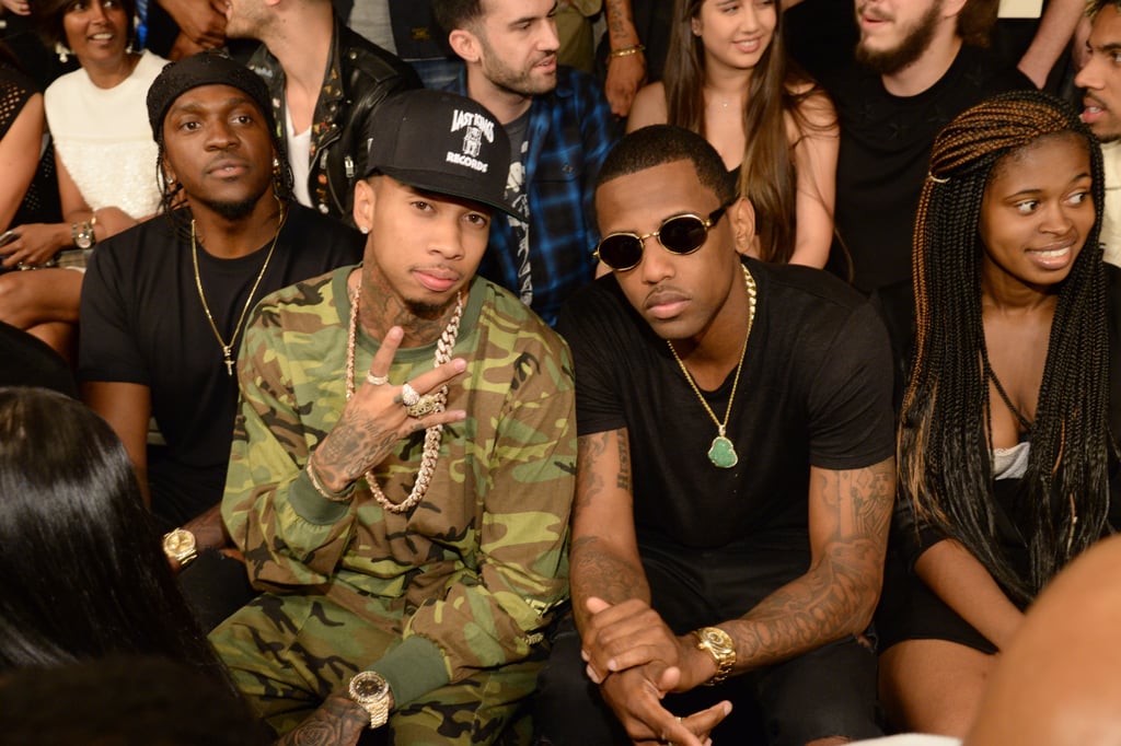 Tyga supported Kylie in the front row, alongside Fabolous.