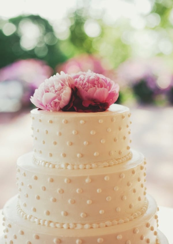 Does it get any simpler or more timeless than this? Beading and pink peonies are the two ingredients it takes to get the look of this stunning cake. 
Photo by Kristen Marie Photography via Style Me Pretty