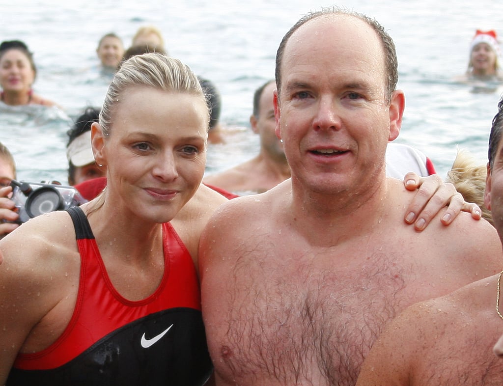 Prince Albert and his then-swimmer girlfriend, Charlene Wittstock, took part in the traditional Christmas swim in Monaco in 2009. 
Source: Getty / Valery Hache/AFP