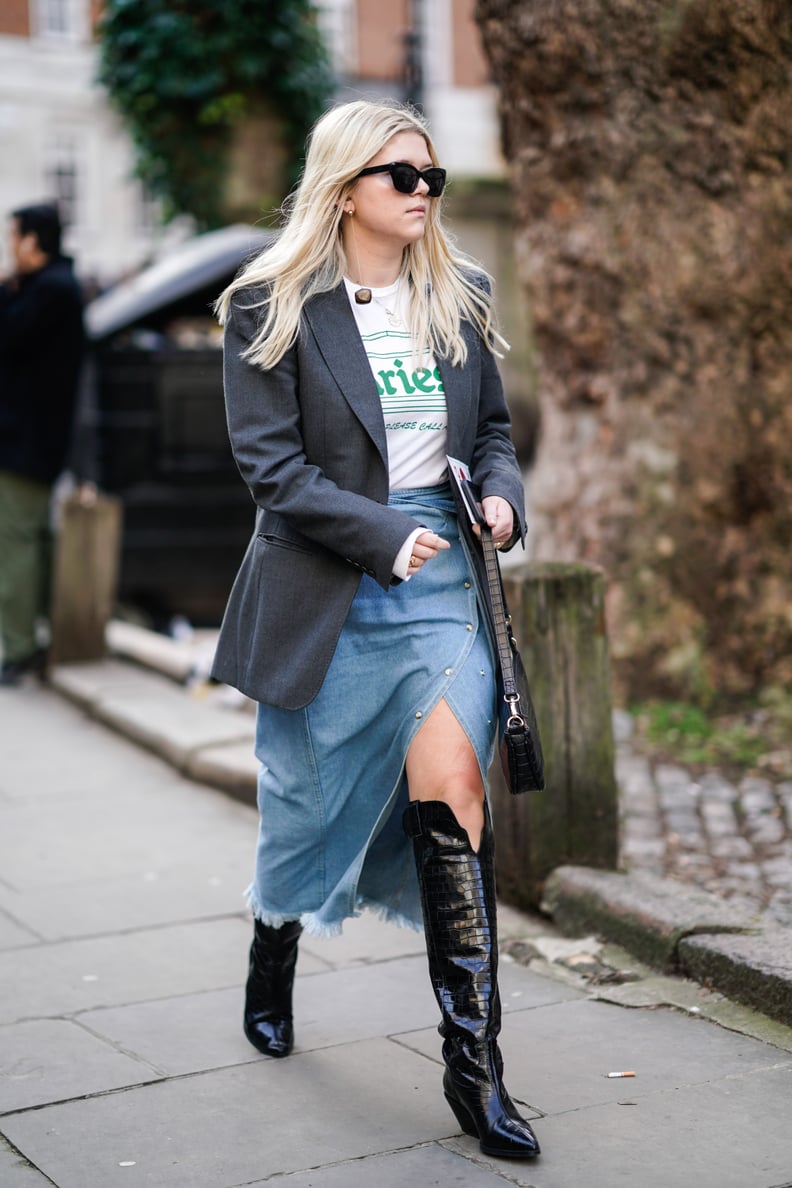 Style a Slitted Skirt With Knee-High Boots, a Graphic Tee, and a Blazer