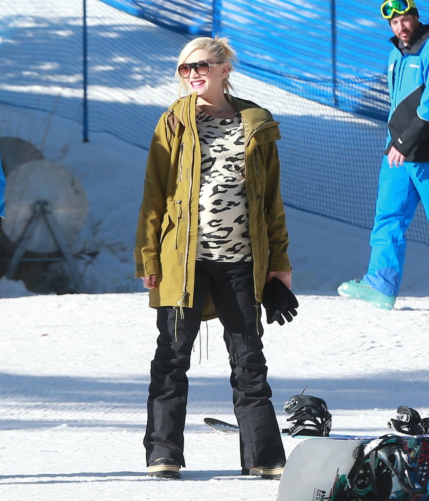 For a day on the slopes with her family, Gwen didn't just pick any old ski parka. She covered up her leopard sweater with a warm jacket in an unexpected hue: olive green.