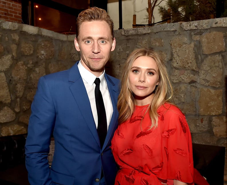 LOS ANGELES, CA - MARCH 22:  Actors Tom Hiddleston (L) and Elizabeth Olsen pose at the after party for the premiere of Sony Pictures Classic's 