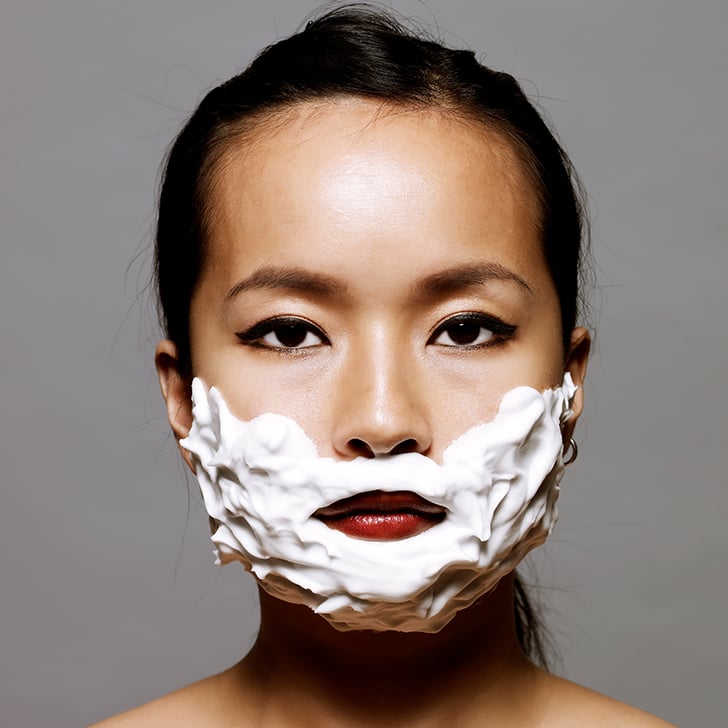 shaving mustache with razor female