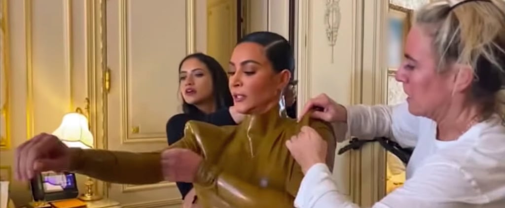 Watch Kim Kardashian Squeeze Into Her Latex Balmain Outfit