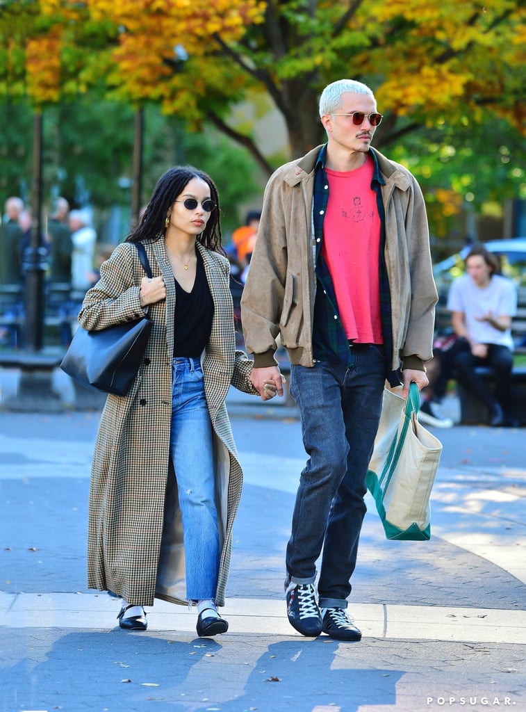 Her couple style with husband Karl Glusman is pretty rad too. They often keep it low-key in '90s-inspired outfits like Zoë in this plaid trench paired with mom jeans.