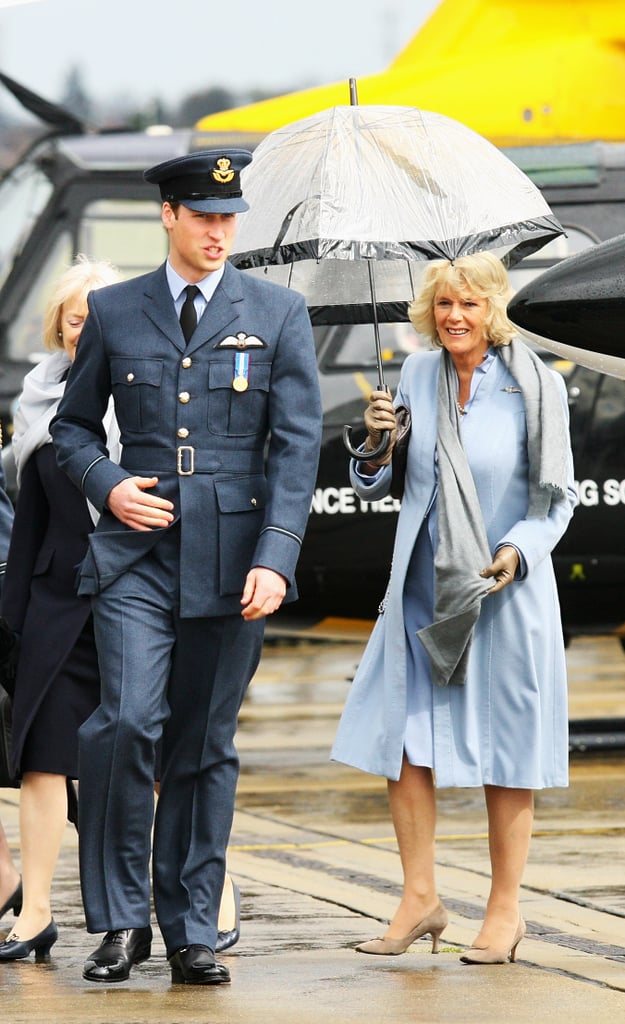 William and Camilla braved the rain during his RAF graduation ceremony in England in April 2008.