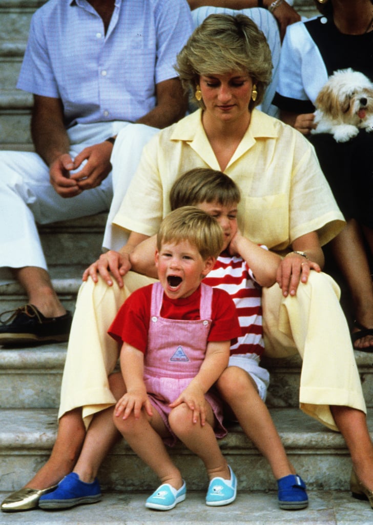 The boys sat in their mother's lap during a 1987 trip to Spain.