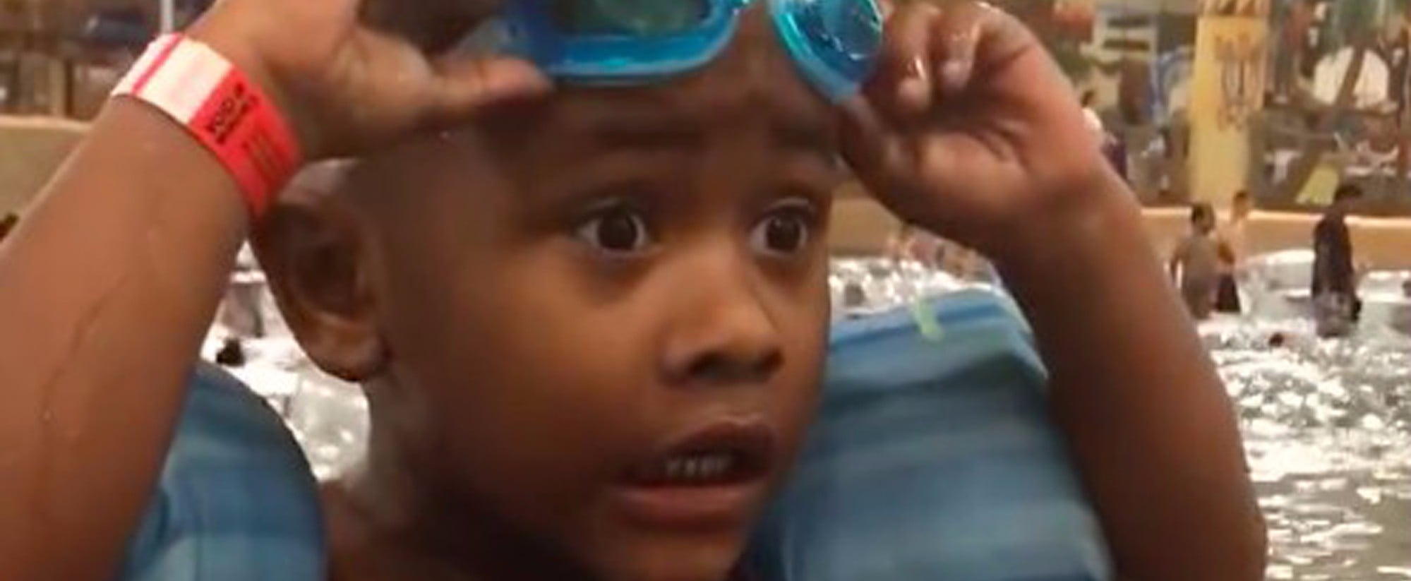 Little boy looking for goggles top