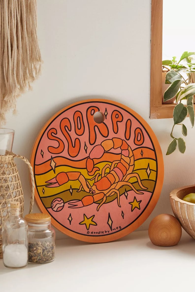 Best Gifts For Scorpio: Doodle By Meg For Deny Zodiac Round Cutting Board