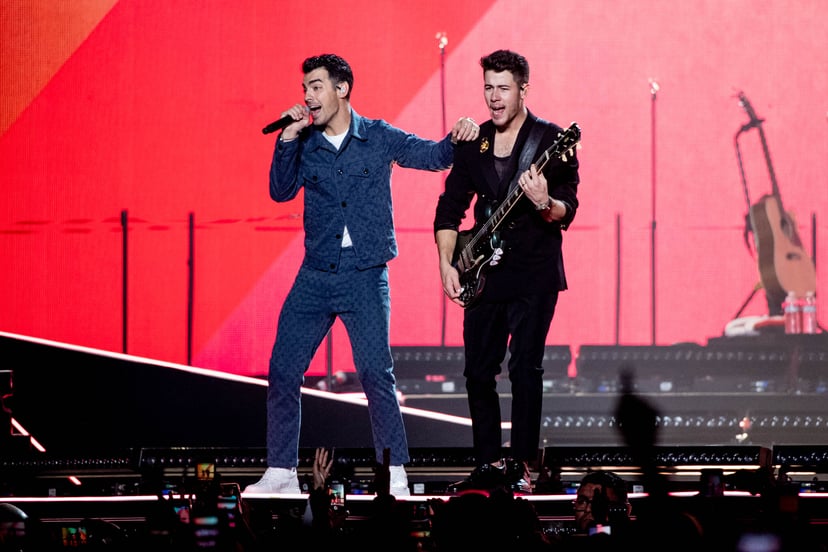 INGLEWOOD, CALIFORNIA - DECEMBER 14: Joe Jonas and Nick Jonas perform onstage at 'Jonas Brothers in Concert' at The Forum on December 14, 2019 in Inglewood, California. (Photo by Emma McIntyre/Getty Images)