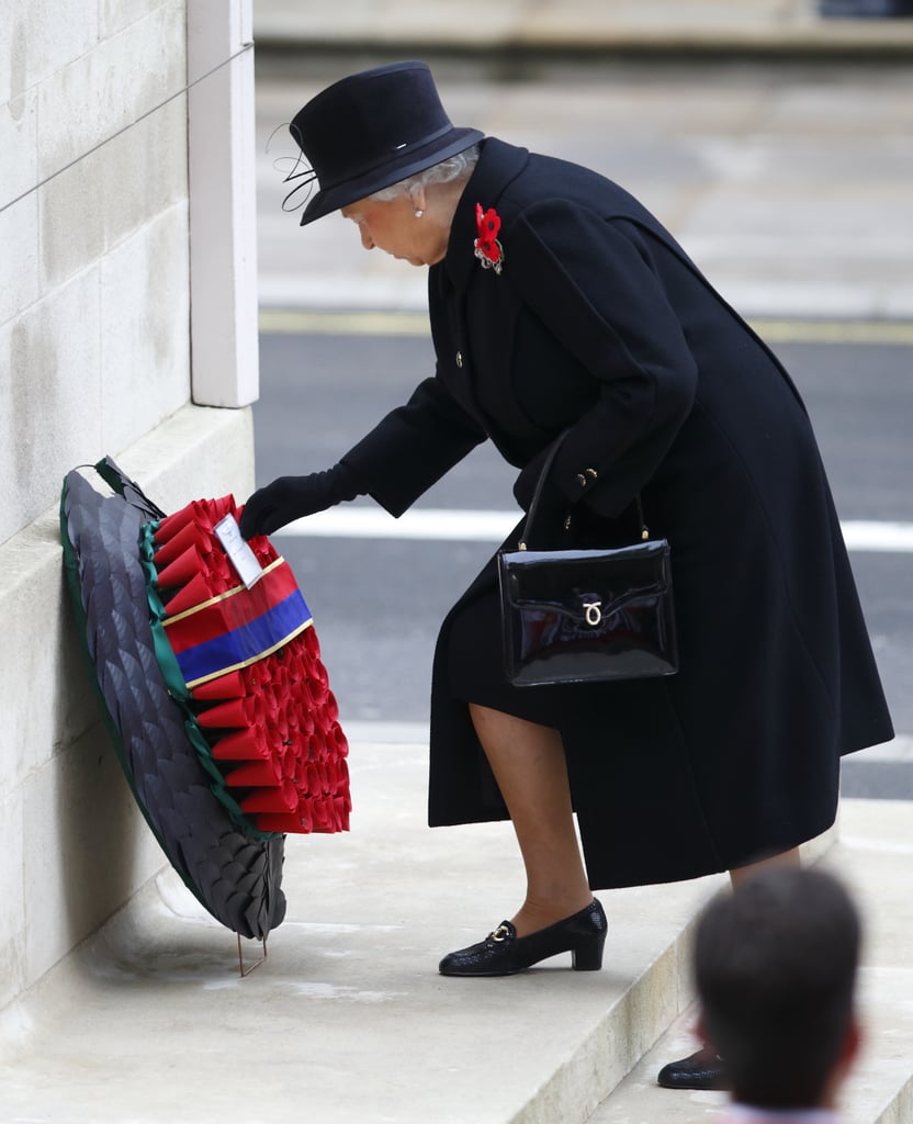 Queen Elizabeth II laid the first wreath at the Cenotaph on Whitehall in London.