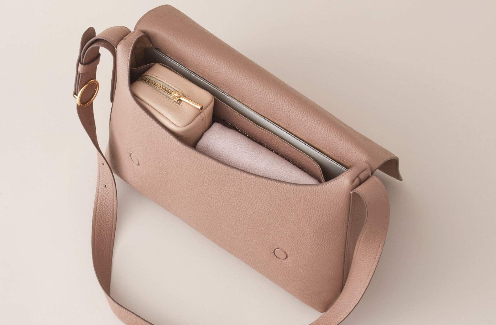 the ultimate designer bag list: 10+ bags that fit your work laptop