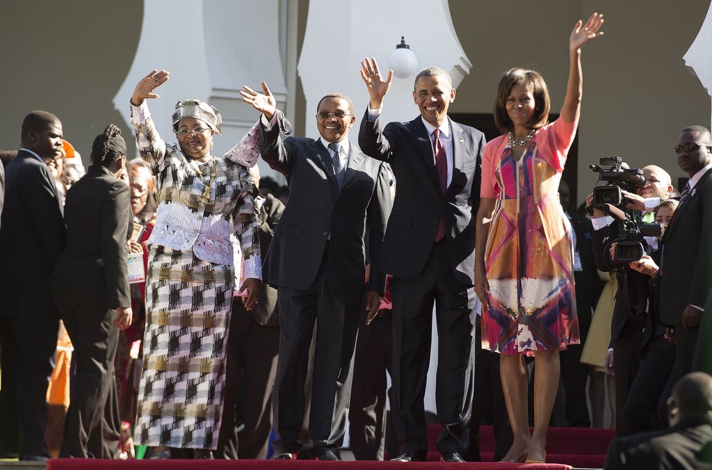 In Tanzania, the Obamas waved alongside Tanzanian President Jakaya Kikwete and First Lady Mama Salma Kikwete in July 2013.