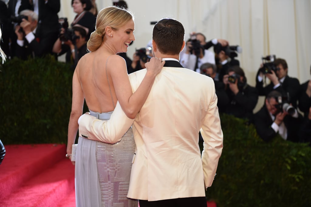 Diane Kruger and Joshua Jackson stayed close while posing for photographers.