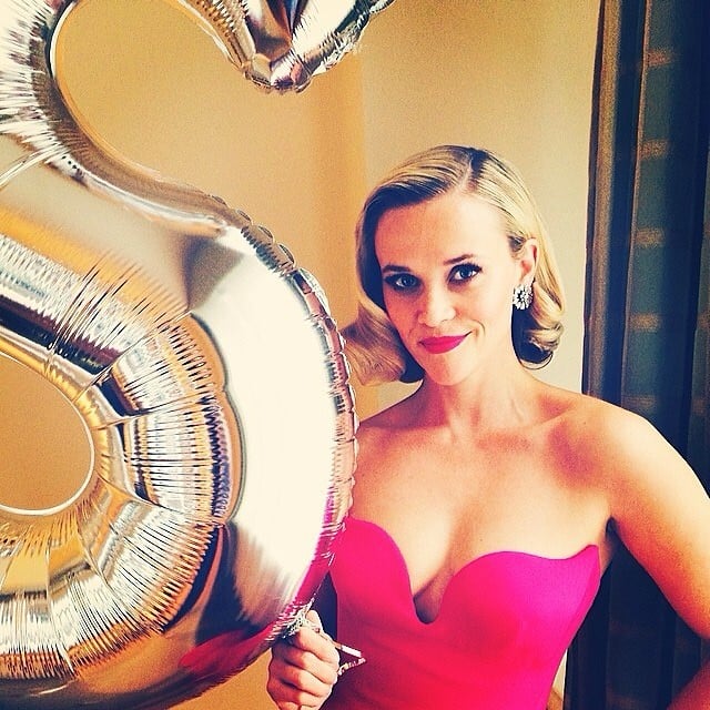 Reese posed aside Stella's big "S" balloon. 
Source: Instagram user reesewitherspoon