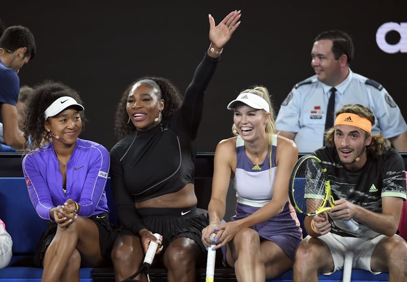 Serena Williams of the US (2/L) shares a lighter moment  with Naomi Osaka of Japan (L),  Caroline Wozniacki of Denmark (2/R) and Stefanos Tsitsipas of Greece (R) as they and other top players play in the Rally for Relief charity tennis match in support of