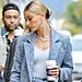 Hailey Baldwin Wearing Her Bieber Necklace With a Blue Coat