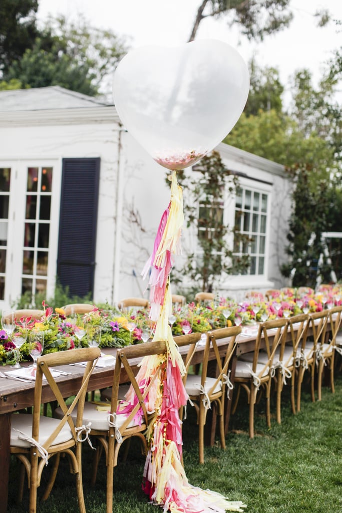 A long rustic table held shower goodie bags at each seat for guests.