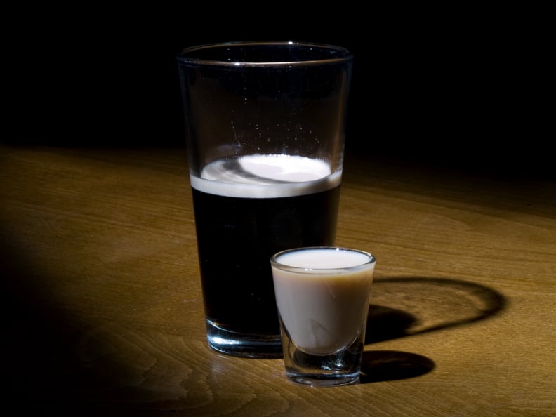 A popular Irish drink, the Irish Car Bomb.  A glass of Guinness beer and a shot of irish cream.
