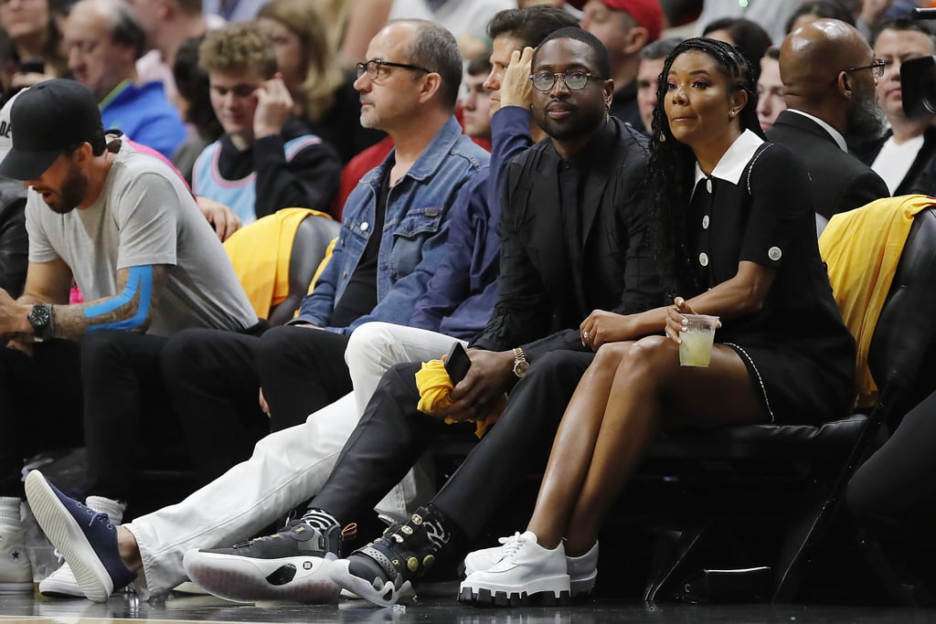 Gabrielle Union and Dwyane Wade Dodge Basketball at NBA Game