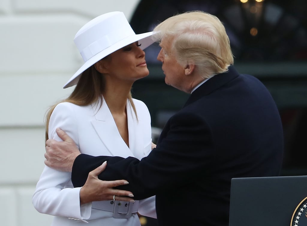 Melania Trump White Hat and Michael Kors Suit 2018