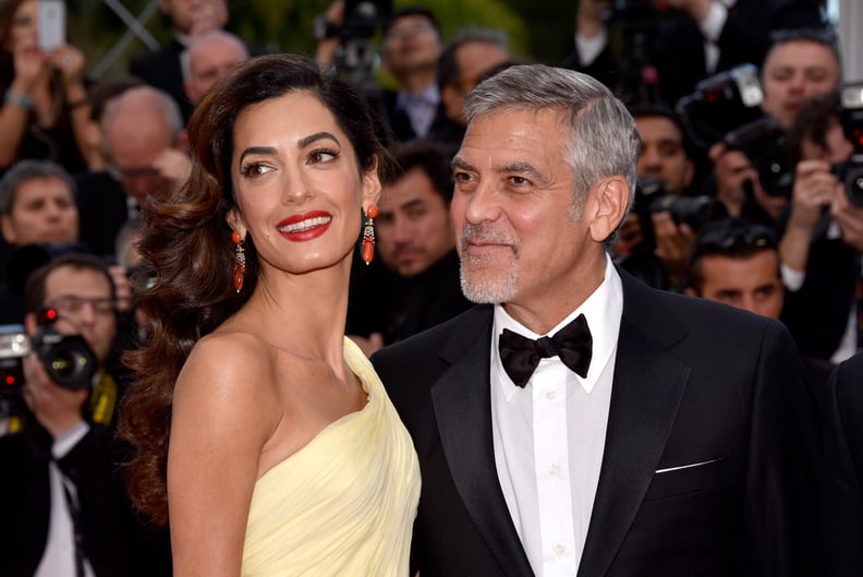 CANNES, FRANCE - MAY 12:  Actor George Clooney and his wife Amal Clooney attend the 