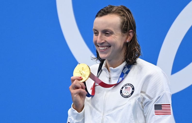 Gold medallist USA's Kathleen Ledecky poses with their medal after the final of the women's 800m freestyle swimming event during the Tokyo 2020 Olympic Games at the Tokyo Aquatics Centre in Tokyo on July 31, 2021. (Photo by Jonathan NACKSTRAND / AFP) (Pho