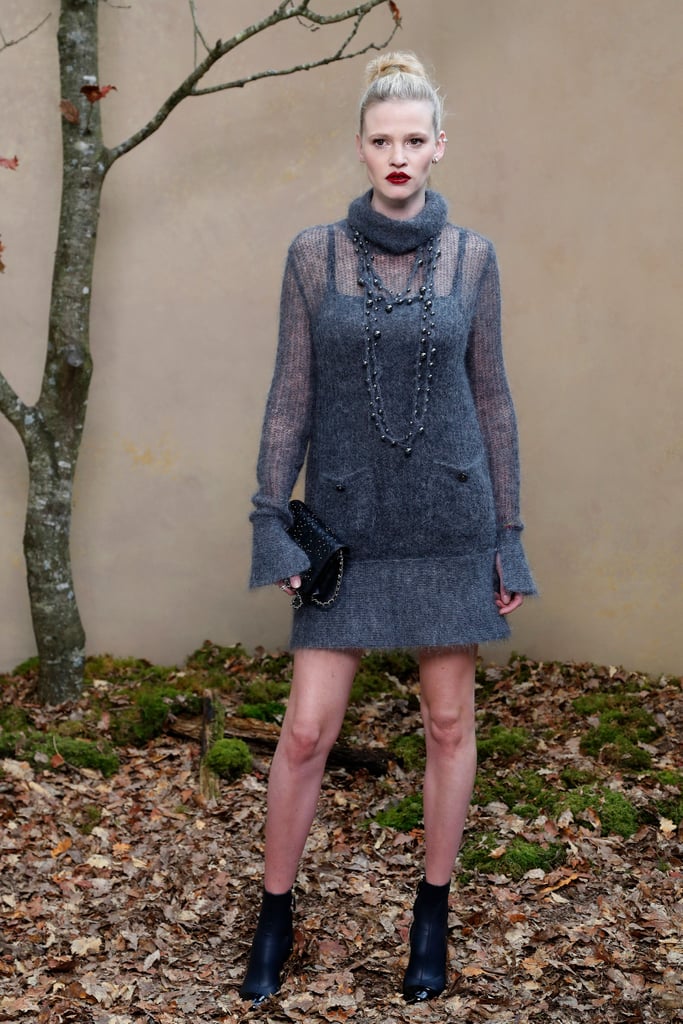 Lara Stone Wore Her Jumper Dress Draped With a Beaded Necklace
