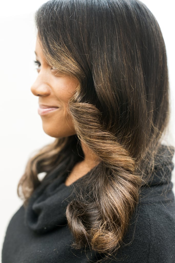 And to achieve the perfect vintage wave, use a paddle brush to clump curls together. But if you want a more formal updo, here's how you can take this glamorous look up a few more notches . . .