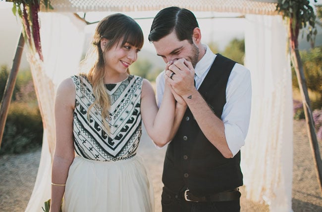 Tip: If the groom's wedding band is unique, let that be the focus of a couple shot.
Photo by Katie Pritchard via Green Wedding Shoes