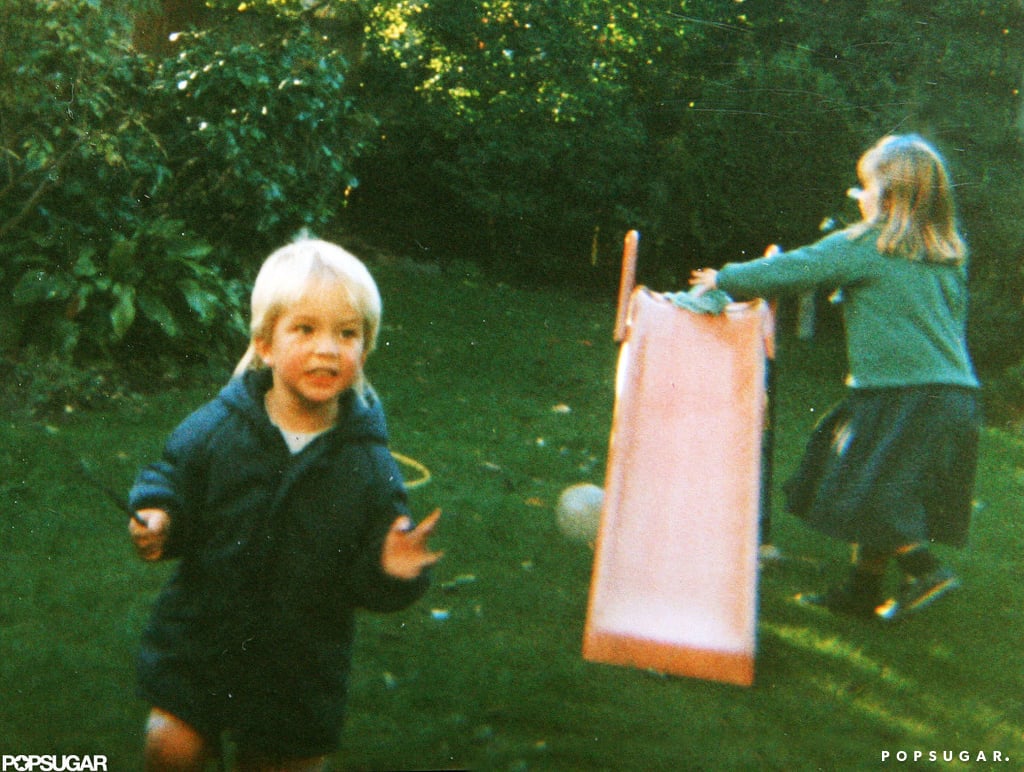 Rob played on a slide with one of his sisters.