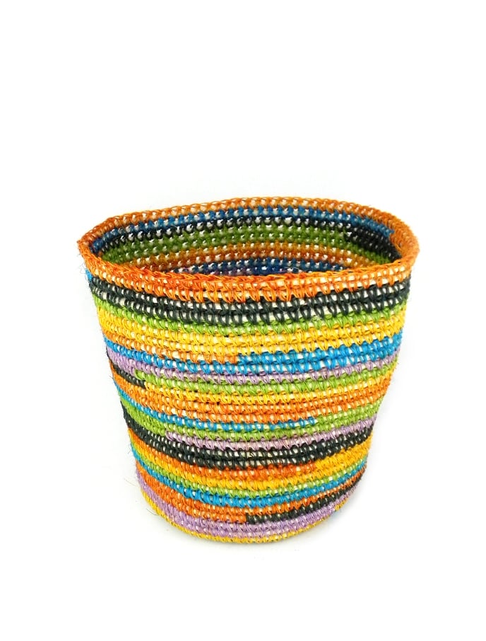 Upgrade your small storage with a natural fiber basket ($32), handwoven by artisans in South America. Its rainbow of summery hues and eco-friendly construction make it the perfect place to store magazines, toys, and toiletries. 
— MW