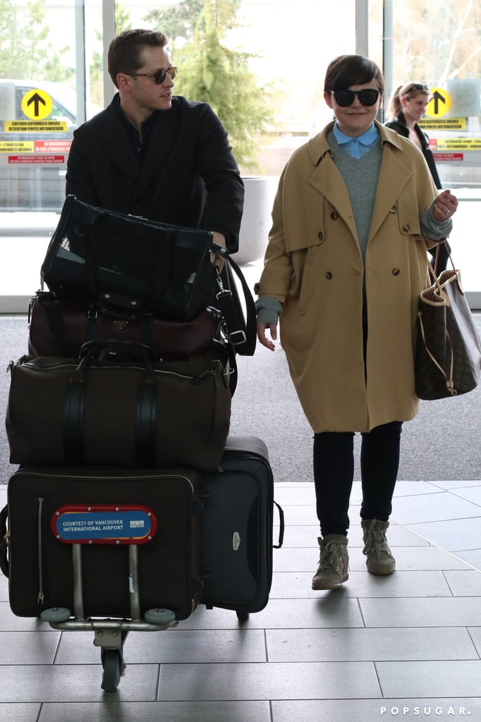 Josh Dallas proved he's a real-life prince charming when he pushed his and pregnant fiancé Ginnifer Goodwin's luggage at Vancouver International Airport on Sunday.