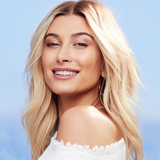 Hailey Bieber's Unfiltered Opinion on That "Pinky Finger" Drama
Speaking of being open (and frankly, bullying), her husband Justin Bieber's docuseries Changes gave a peek into the past few years of the singer's journey, peeling back the curtain on aspects of the couple's lives — all of which, naturally, opens you up to public scrutiny. Perhaps the most peculiar example of that was the spike in interest over Hailey Bieber's pinky finger across social media. She took to Instagram to explain the crooked nature was because of genetic condition, but took down the post shortly thereafter.
"I couldn't believe were even talking about it," she laughed. "I was actually just trying to be funny [with the post]. Like a, if people were so curious about why that is, here's why. I think people took it wrong. They thought I was being dead serious. Like, 'Poor me. I deal with this condition in my finger.' I was actually making fun of myself. You know, I was trying to just poke fun at it and make it into a light situation. There are so many more important things happening in the world. I just think people took it the wrong way, which is why I actually ended up deleting it because I was trying to just be silly."
On Self-Care — and How Clean Beauty Plays Into It
Being immersed in the day-to-day of modeling and beauty campaigns can sound exciting, but it can take a toll on your mental health — and skin. Since teaming up with BareMinerals (which is celebrating its 25th year on the market), Bieber says she's learned the importance of keeping it simple.
"I keep things superminimal in terms of treatments, but I'm all about at-home treatment stuff," she said. "I love to be home and sit in a bath and do a mask and put oils all over body and pretend like I'm at a spa. Honestly, I think what you do at home matters more. I try to be conscious about using clean ingredients, which is why I love the Pureness skincare line from Bare and everything they do."
Hailey Bieber's Most Meaningful Tiny Tattoo (Present and Future) in Her Collection