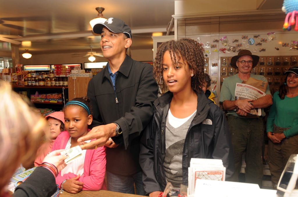 In August 2009, the girls indulged in some snacks with their dad as they visited Alley's General Store in West Tisbury, MA.