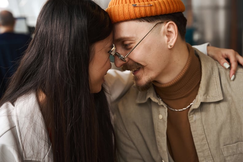 Couple Looking Into Each Other's Eyes While Hugging