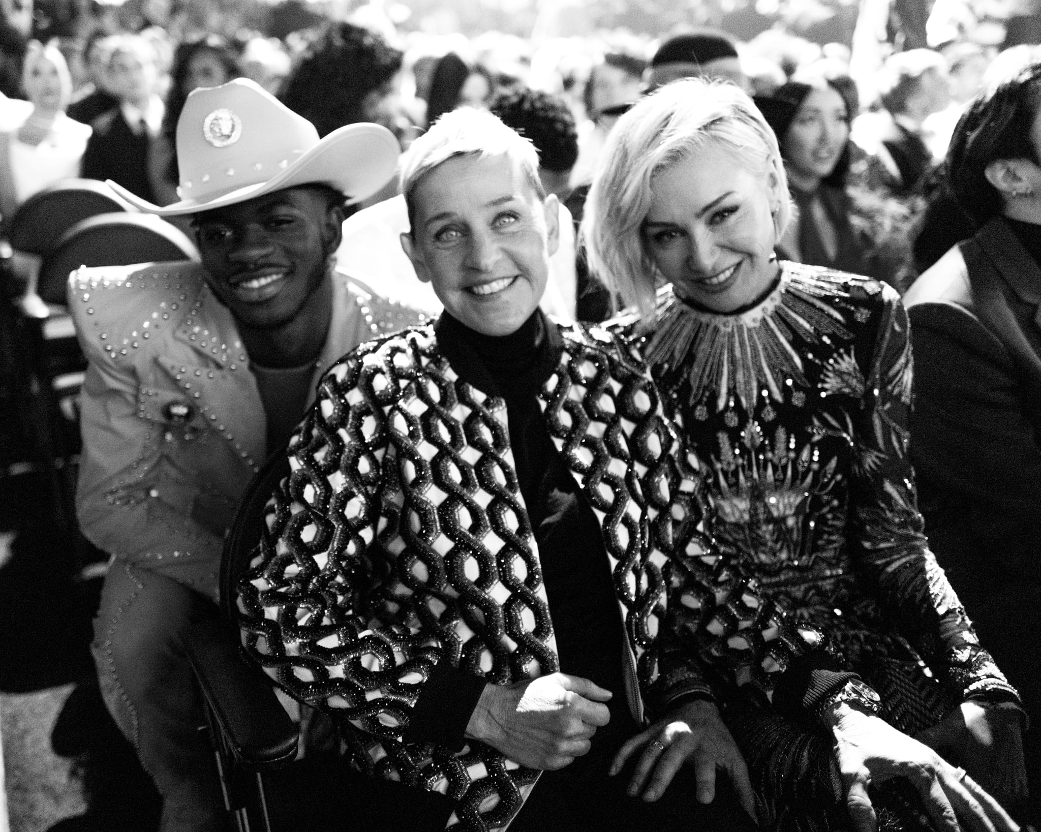 LOS ANGELES, CALIFORNIA - JANUARY 26:(EDITOR'S NOTE: This image has been converted to black and white. Colour version available.) (L-R) Lil Nas X, Ellen DeGeneres, and Portia de Rossi attend the 62nd Annual GRAMMY Awards on January 26, 2020 in Los Angeles, California. (Photo by John Shearer/Getty Images for The Recording Academy)