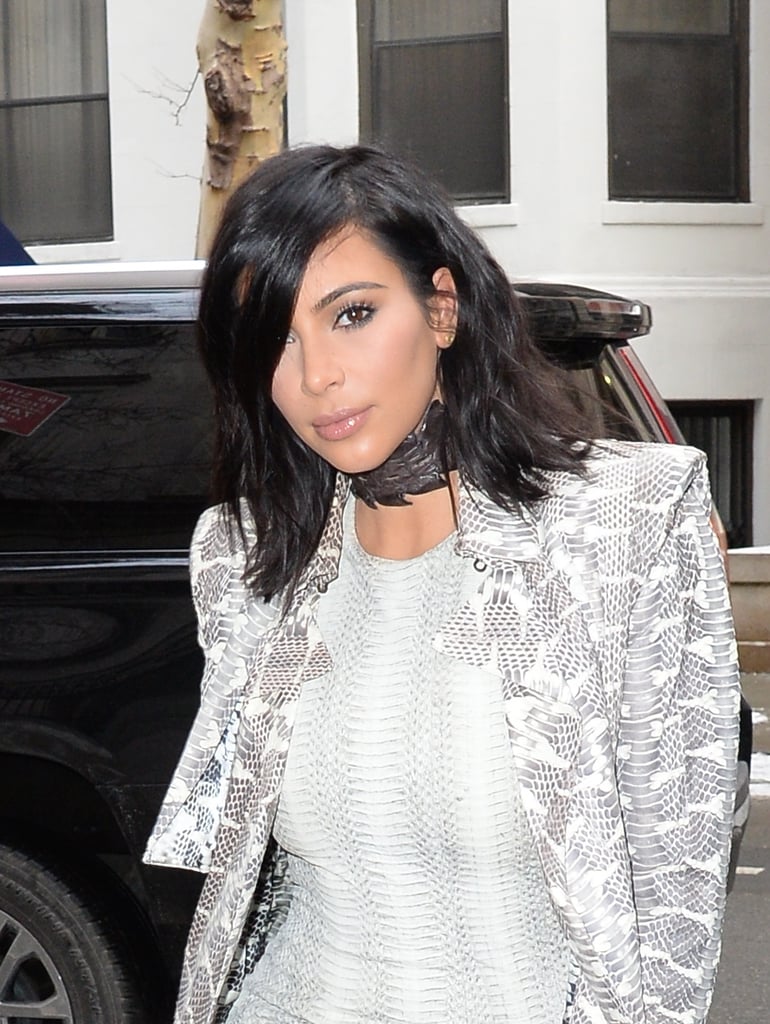 While Khloé Wore a Turtleneck, Kim Filled in the Empty Space With a Thick Black Choker