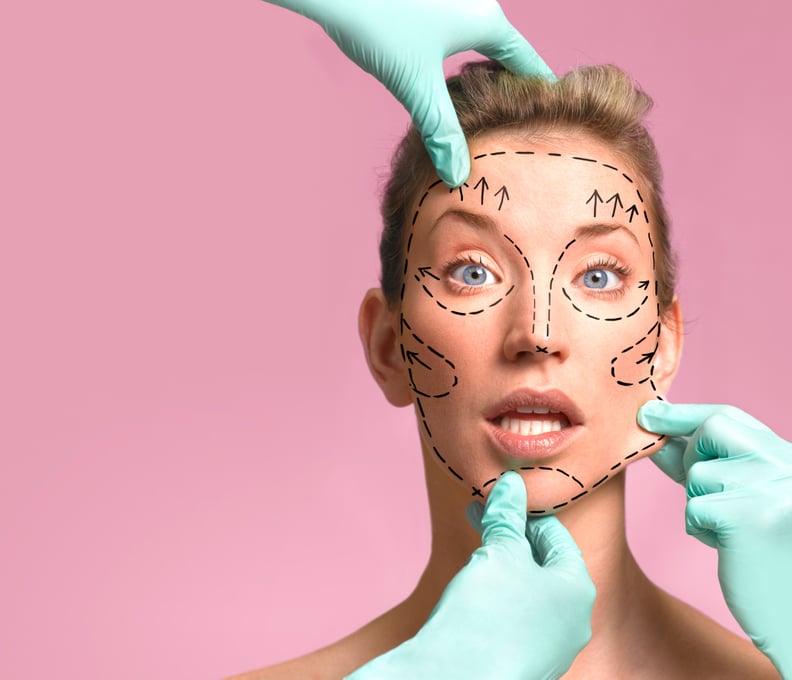 Plastic surgeon marking up for surgery