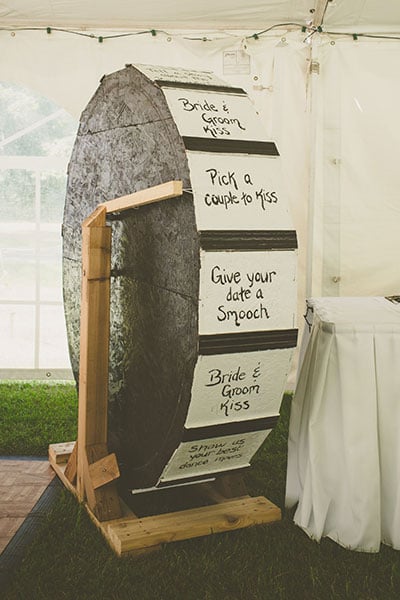Get the party started with a wheel of fortune containing activities for guests to complete during the reception.