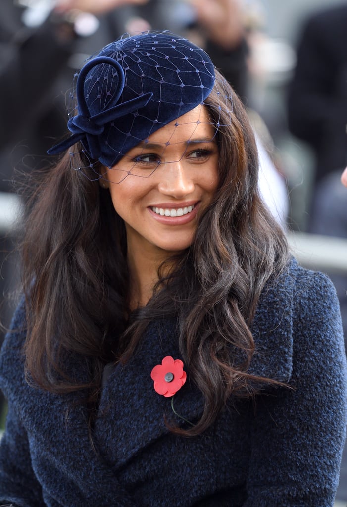 While attending the 91st Field of Remembrance at Westminster Abbey in London in 2019, Markle chose a monochromatic outfit and wore a navy Sentaler coat with a Philip Treacy hat to match.